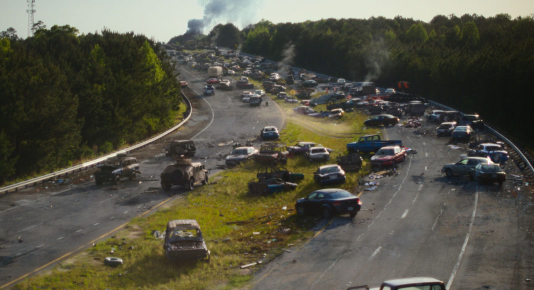 Freeway filled with gridlock and wrecked cars