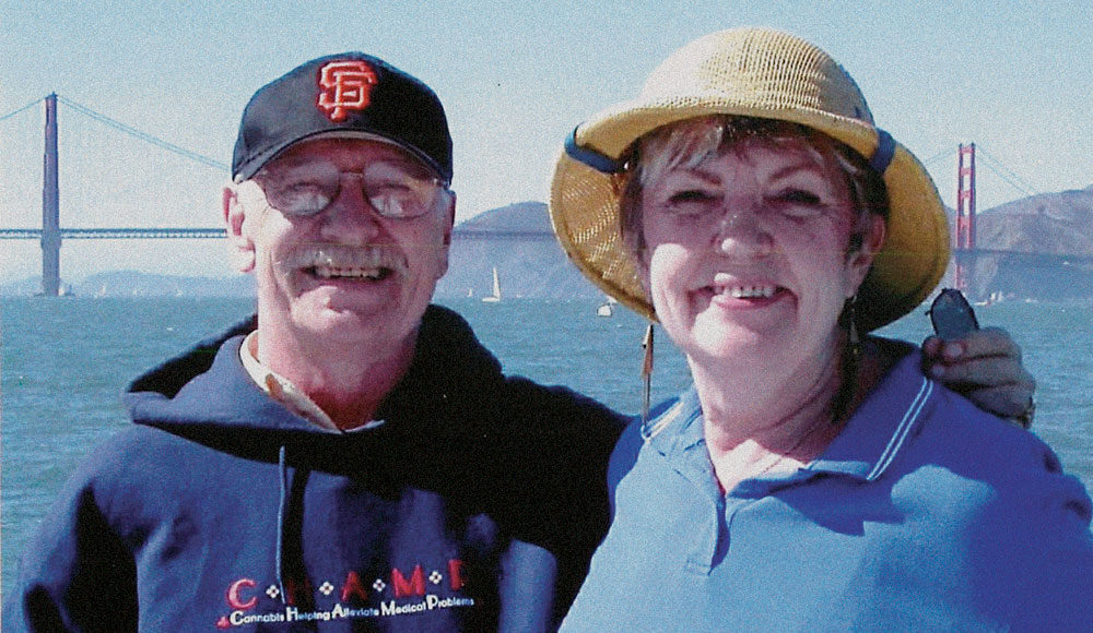Man and woman in front of the water
