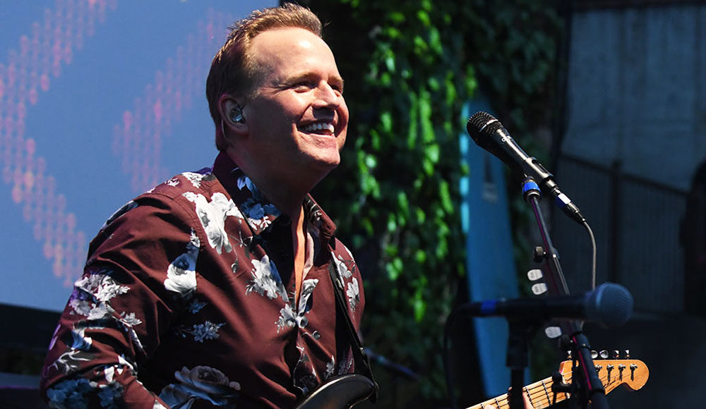 Man playing guitar onstage