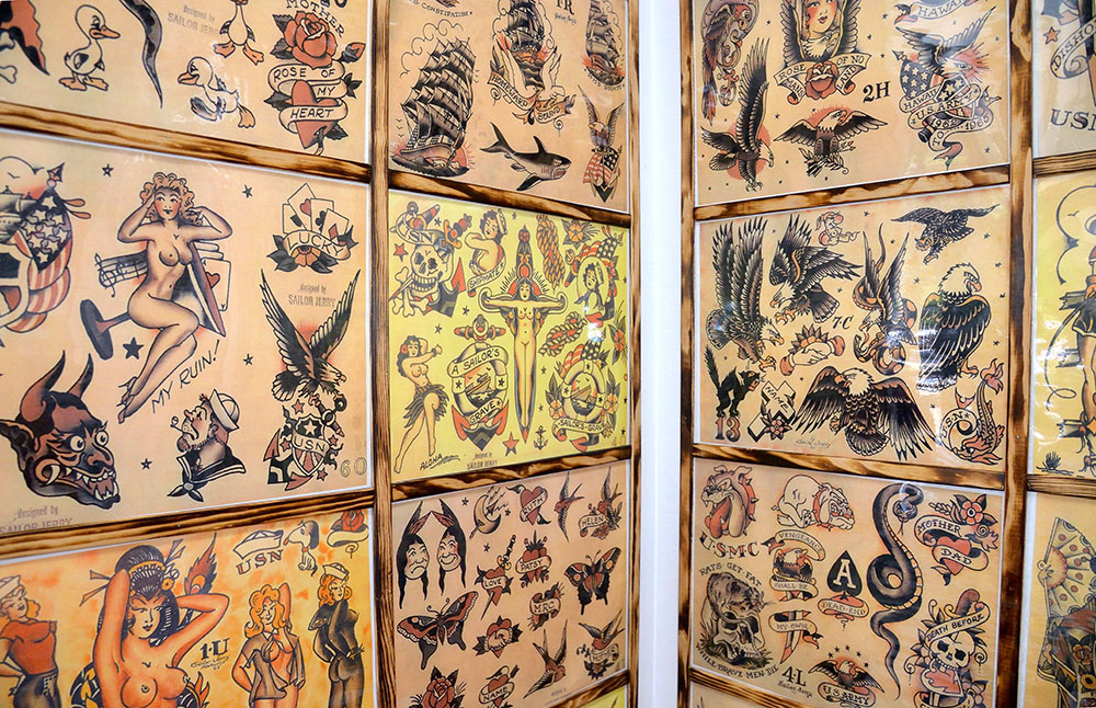 Walls covered with images of tattoo artwork