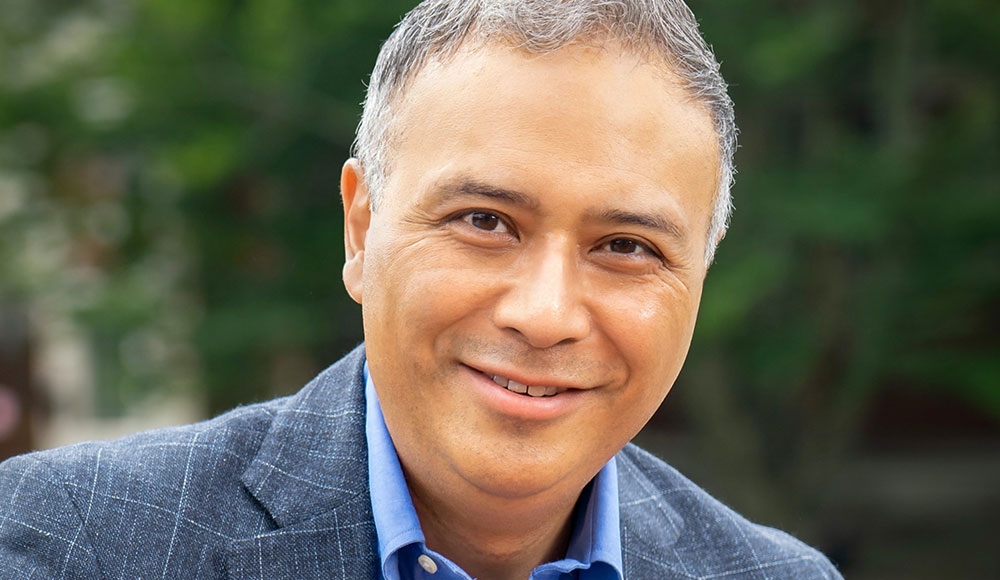 Portrait of a man wearing a jacket and shirt