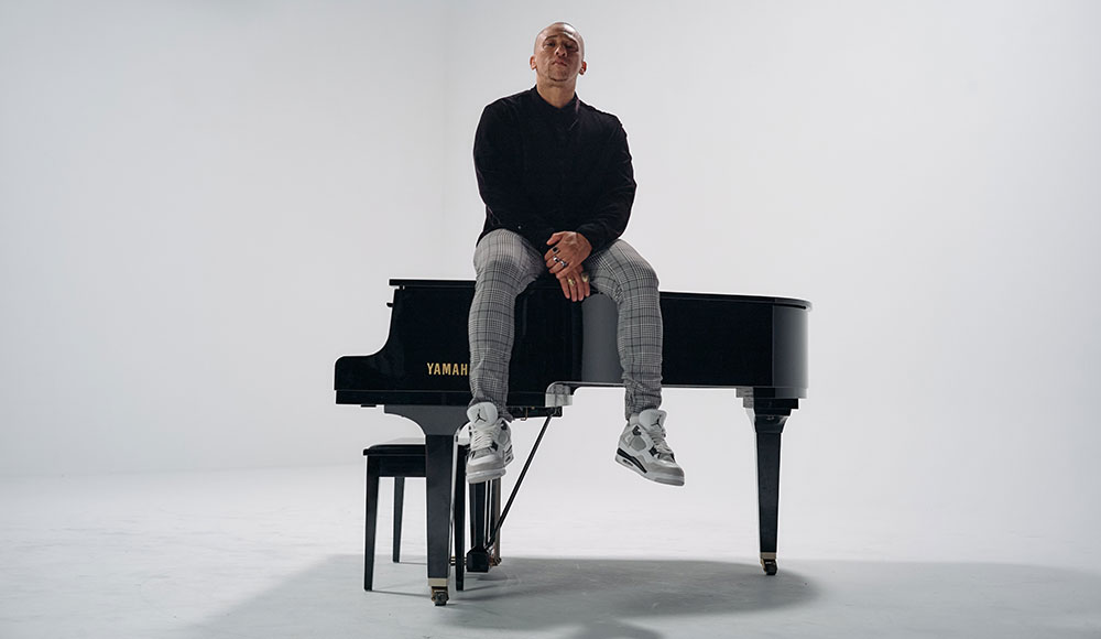 Man sitting on a piano