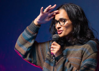 Woman with a microphone on stage
