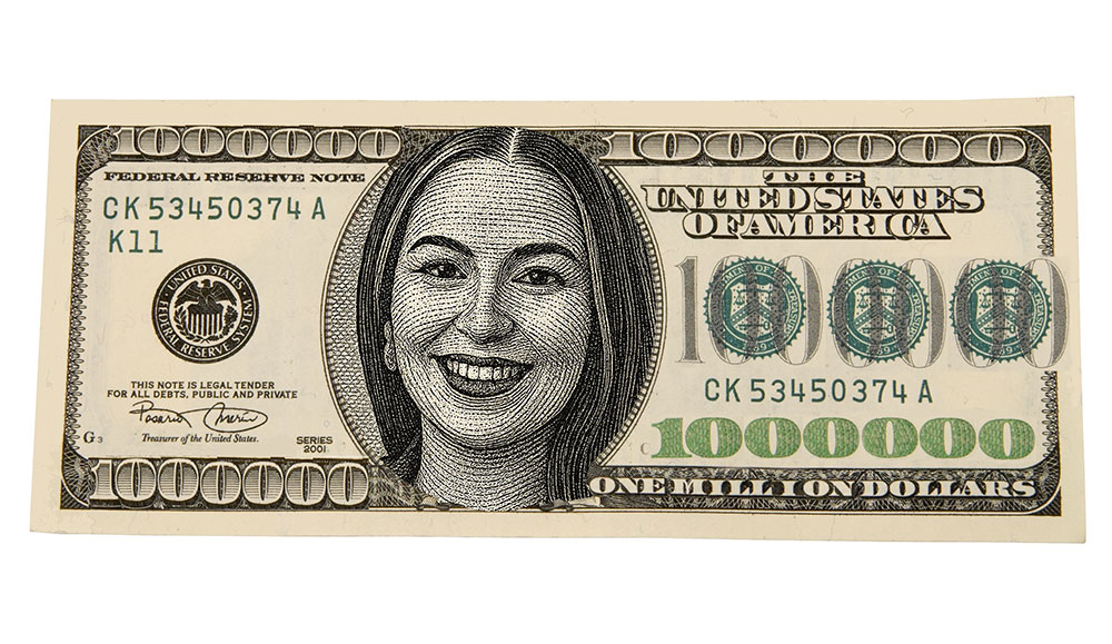 Currency with a line illustration of a woman in the middle of it
