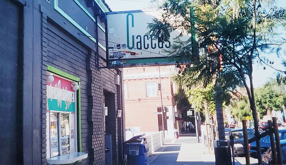 Street scene showing a sign that reads 