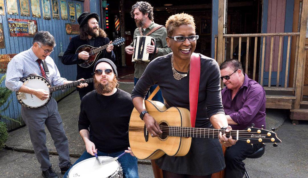 Group of musicians posing for a photo