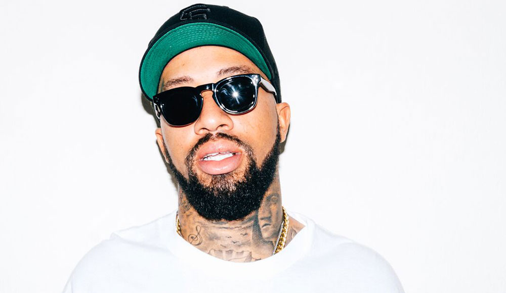 Bearded man wearing sunglasses and a hat