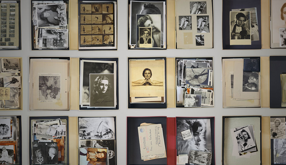 Array of archival photographs and documents laid out on a grid