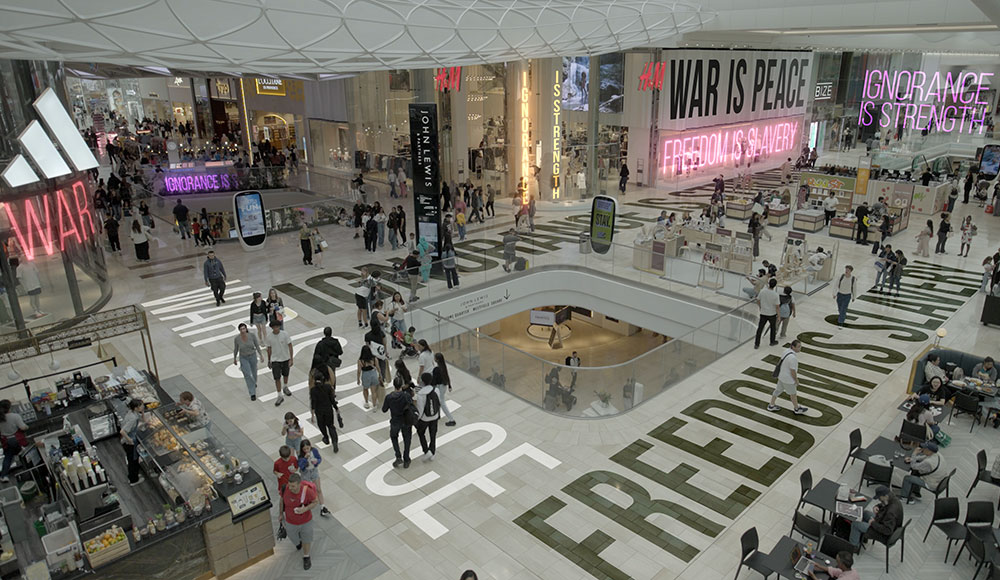 Shopping mall with a bunch of slogans superimposed on various surfaces