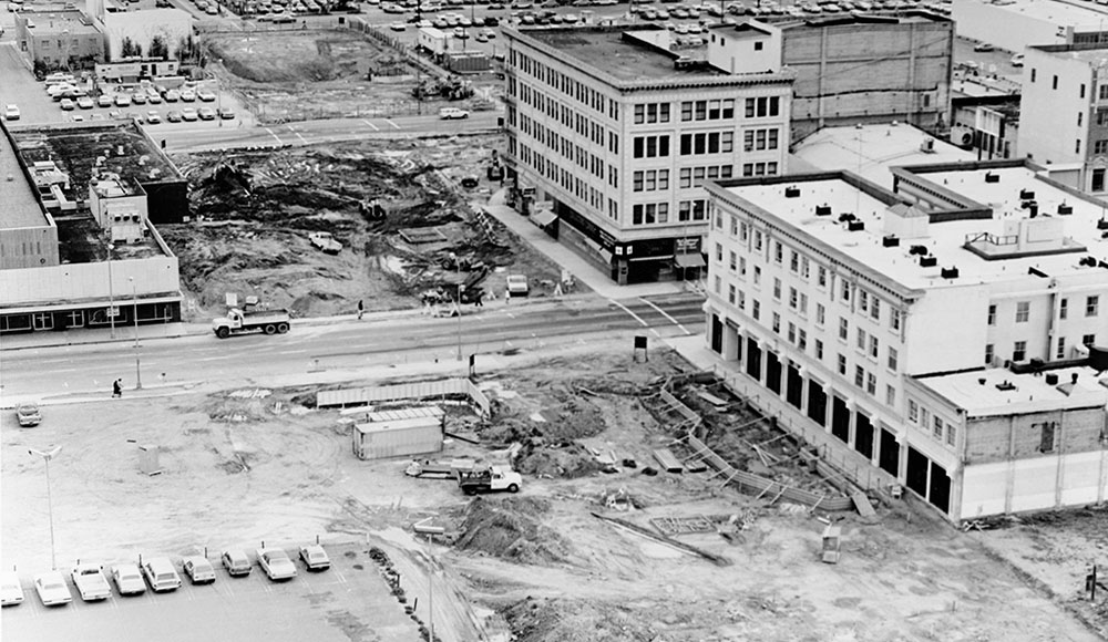 Black-and-white aerial photo of construction area