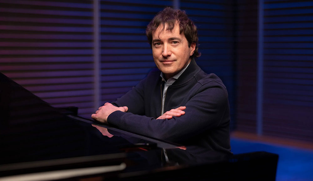 Man posing at a keyboard